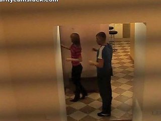Corridor Action With A Horny Couple In A Voyeur Clip
